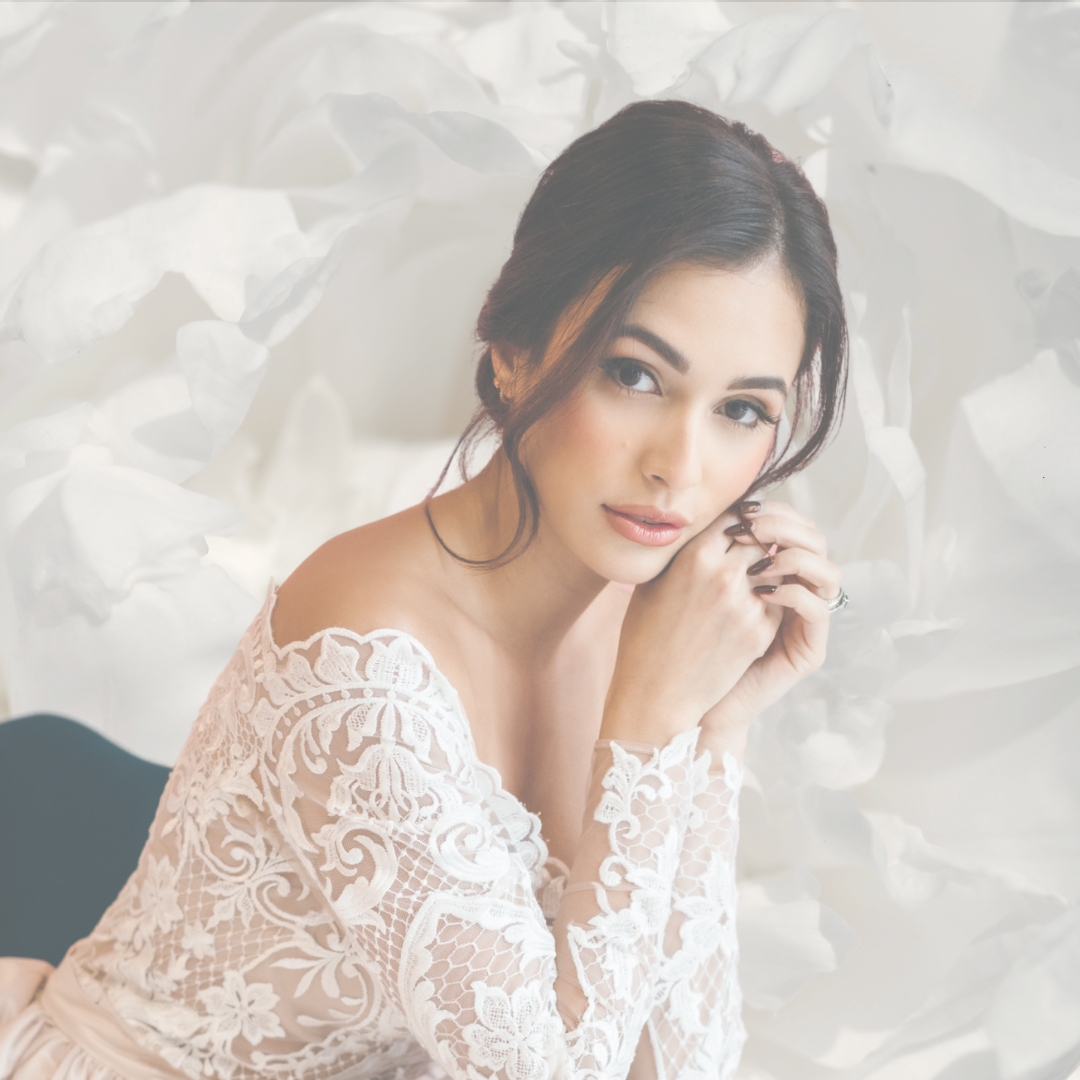 Bride with soft natural glam makeup by Giselle Beauty Artist and elegant bridal updo